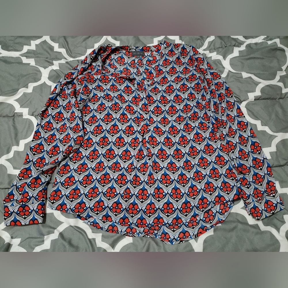 The limited. Size Medium Floral Sheer Blouse Muti-colored.